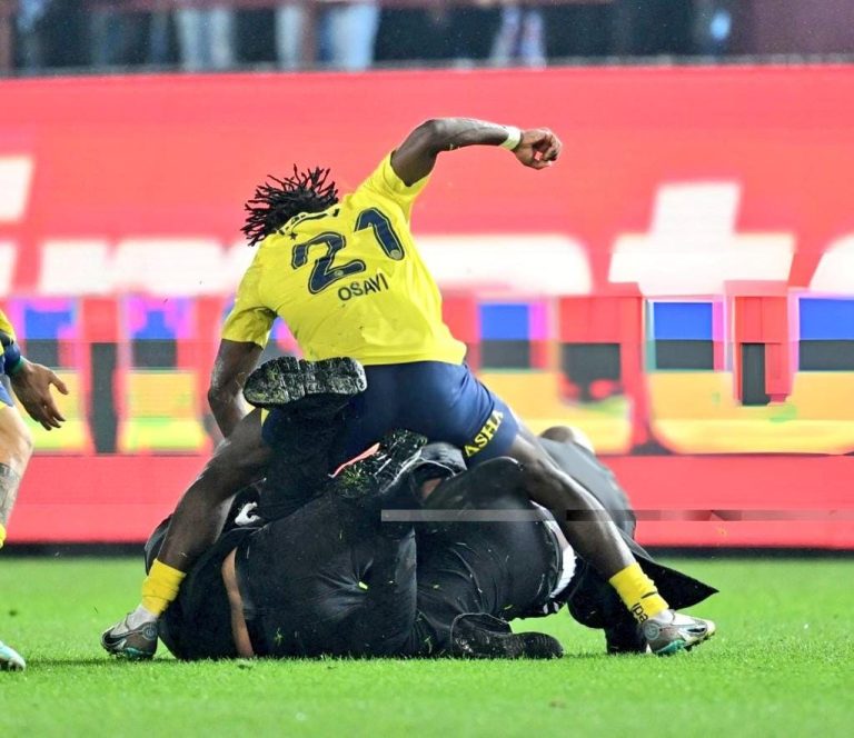 Watch Video of Nigerian Footballer, Osayi-Samuel Defending Teammates Against Pitch Invaders